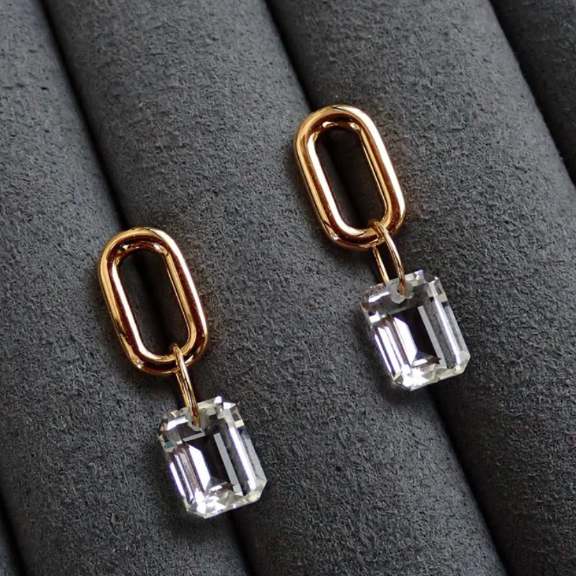 Gold plated 925 sterling silver earrings with elongated link and emerald-cut zirconia drop